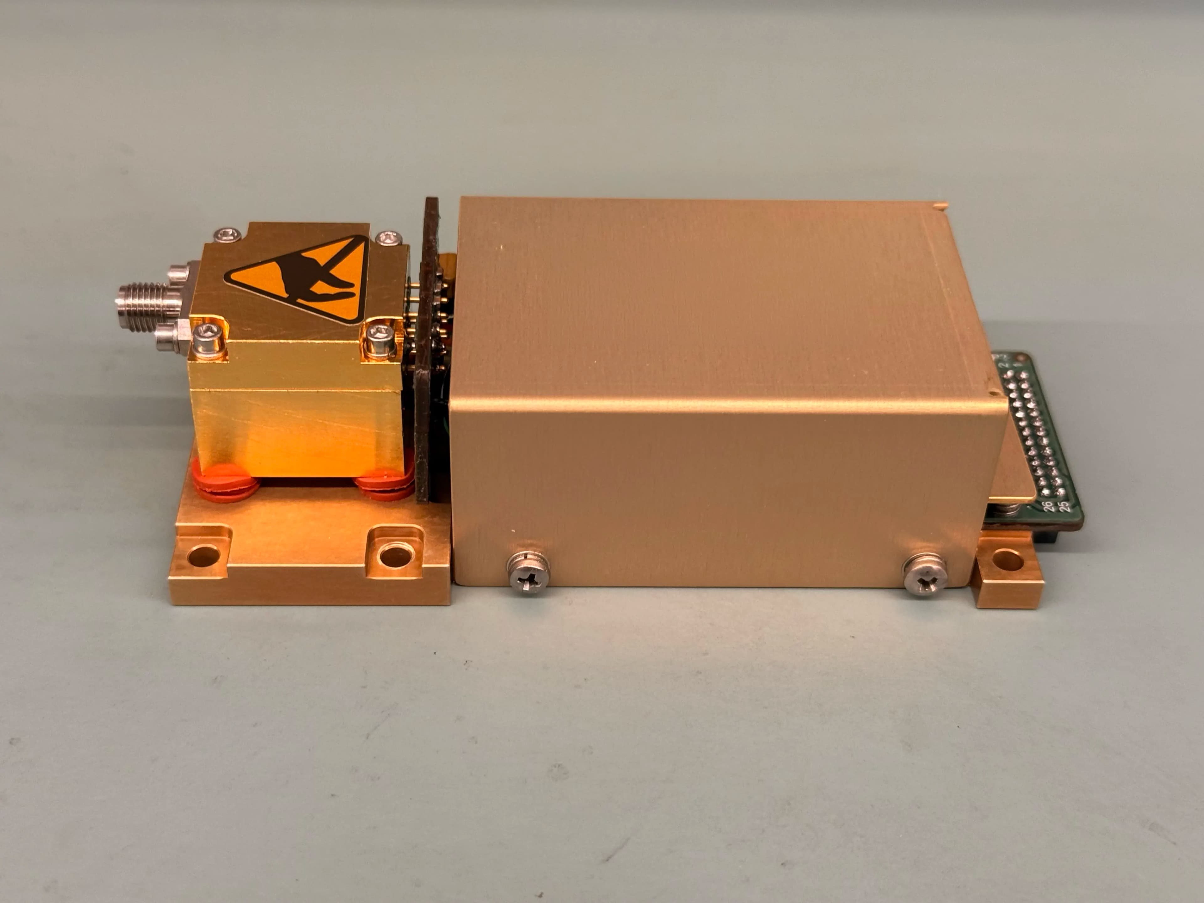 YIG-tuned oscillator hardware: machined housing and RF connectors